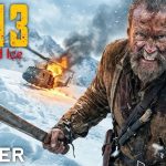 Sisu 3 Blood and Ice official trailer poster featuring Jorma Tommila as the bearded warrior holding a large knife in a snowy battlefield with explosions and burning tank in the background