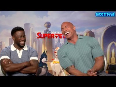 The Rock and Kevin Hart laughing together on a talk show set, showing their fun and friendly chemistry